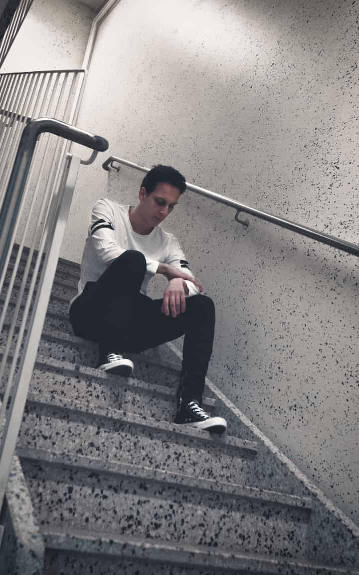 Harald sitting on stairs May 2022