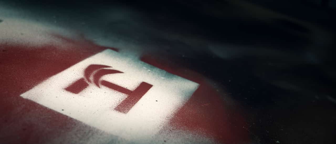 Harald Revery logo spray painted on a wall.