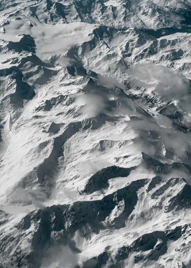 Aerial photography over the Alps: Alpern Winter, Flying from Trieste (Italy) to Stansted (England), 2024