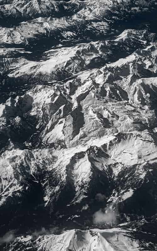 Aerial photography over the Alps: Cool Snow Mountains, Flying from Trieste (Italy) to Stansted (England), 2024
