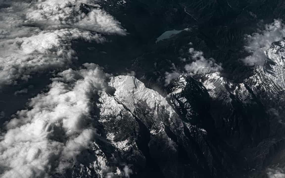 Aerial photography over the Alps: Mountain Top, Flying from Trieste (Italy) to Stansted (England), 2024