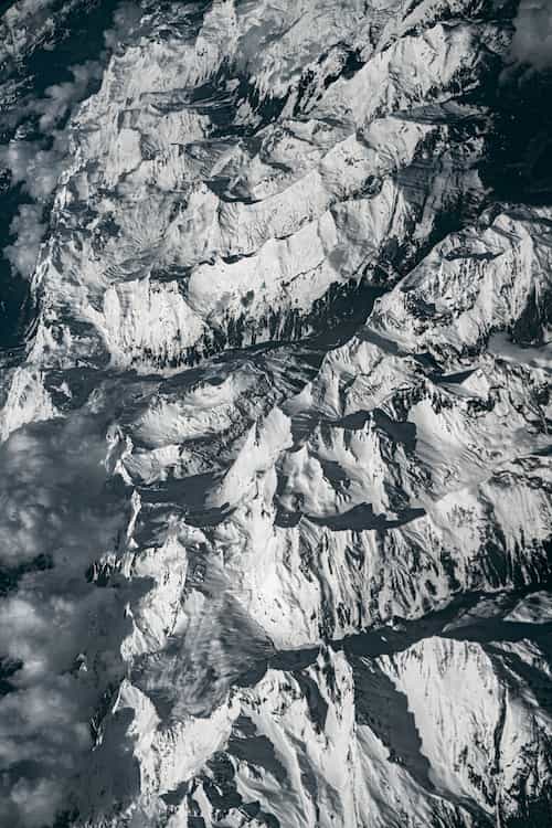 Aerial photography over the Alps: Only White, Flying from Trieste (Italy) to Stansted (England), 2024