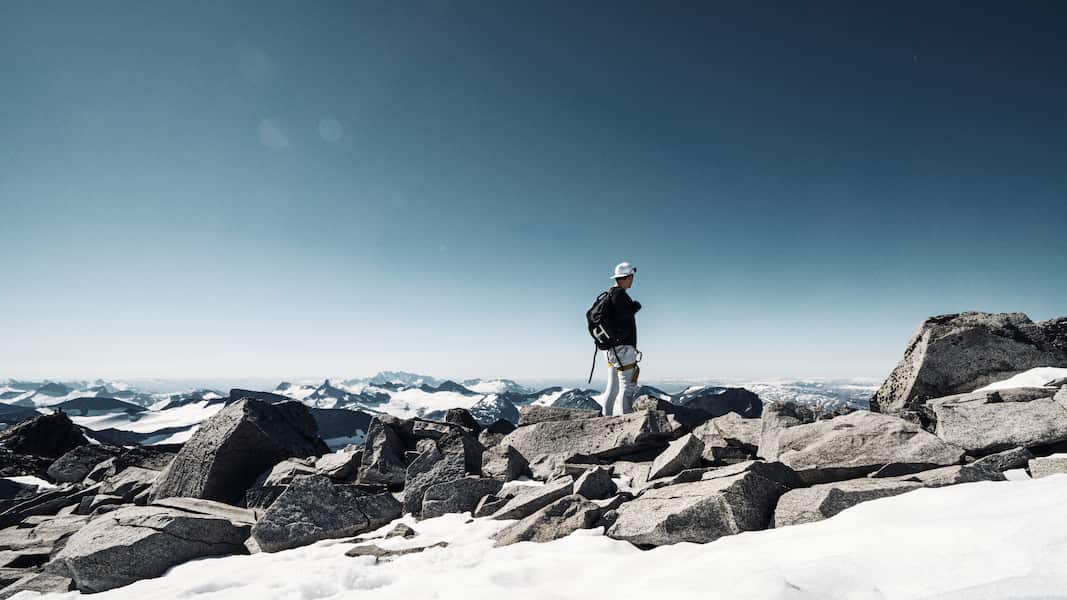 Harald Revery looking at the horizon near the Galdhøpiggen top