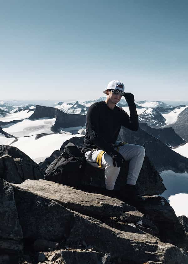 Harald sitting on Galdhøpiggen top