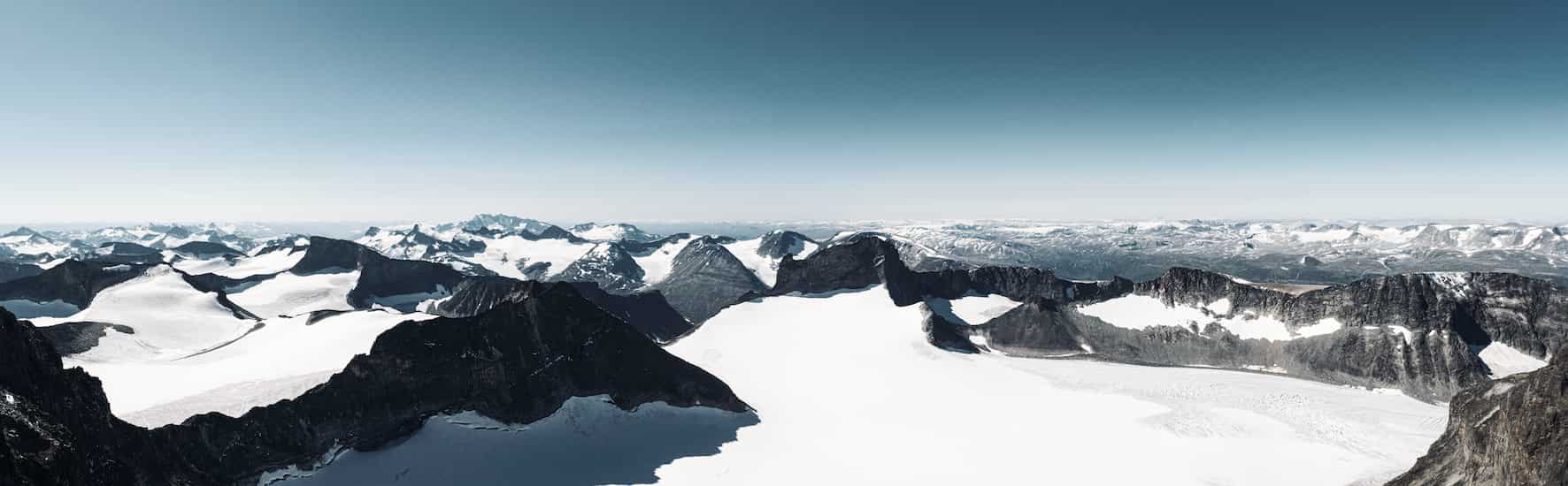 Panorama view over Jotunheimen from Galdhøpiggen mountain top (stitched panorama image)