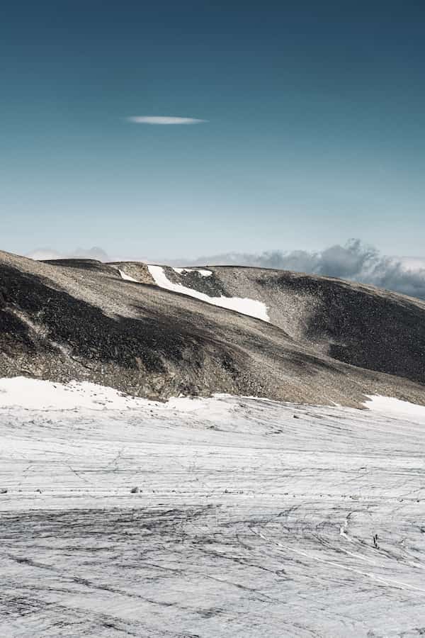 A view over the Styggebreen glacier and a mountain hill